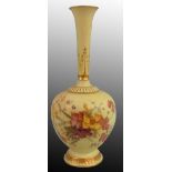 A Royal Worcester blush ivory bud vase, painted floral decoration on apricot ground, gilt