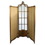 A 19th century gilt three fold screen, the central section with twelve bevelled edge glass panels,
