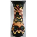 A Moorcroft 'Oberon' pattern waisted vase, tube lined and decorated with honeysuckles, painted and