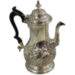 A George III silver coffee pot, by Fuller White, London 1764, the baluster body with embossed and