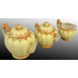 A Royal Worcester blush ivory three-piece tea service, comprising; No. 1534 teapot, Rd No 174295,