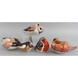 A Royal Crown Derby group of five English Bone China paperweight birds, No. XLIX, silver stopper,