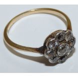 An 18ct gold and diamond cluster ring, collet set with old cut stones, total weight approximately