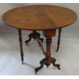 A Victorian mahogany oval drop leaf table, raised on twist supports with stretcher between, fold out