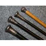 A silver mounted black cane, London 1919, another, London 1916, another 1918 and a fourth, London