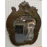 A late 19th century style mirror with bevelled glass