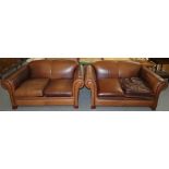 A pair of brown leather two-seater sofas, 173 x 96 cm
