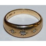 A 9ct gold and diamond ring set with brilliant cut stones, 3 gms