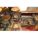 A Tin trunk and contents including gilt picture frames of various sizes, a child's rocking chair,