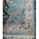 A Chinese style machine made wool rug, 320 cm x 250 cm