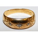 An Edwardian 18ct gold and diamond ring, Birmingham 1905, set with old cut stones, 2 gms