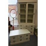 A Laura Ashley white display cabinet/set of drawers, the glazed cupboard with sliding doors over