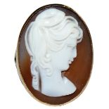 A 9ct gold shell cameo ring, collet set with a lady’s head