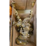A pair of twisted brass candlesticks, Punch and Judy Hearth figures, brass horse with mounted