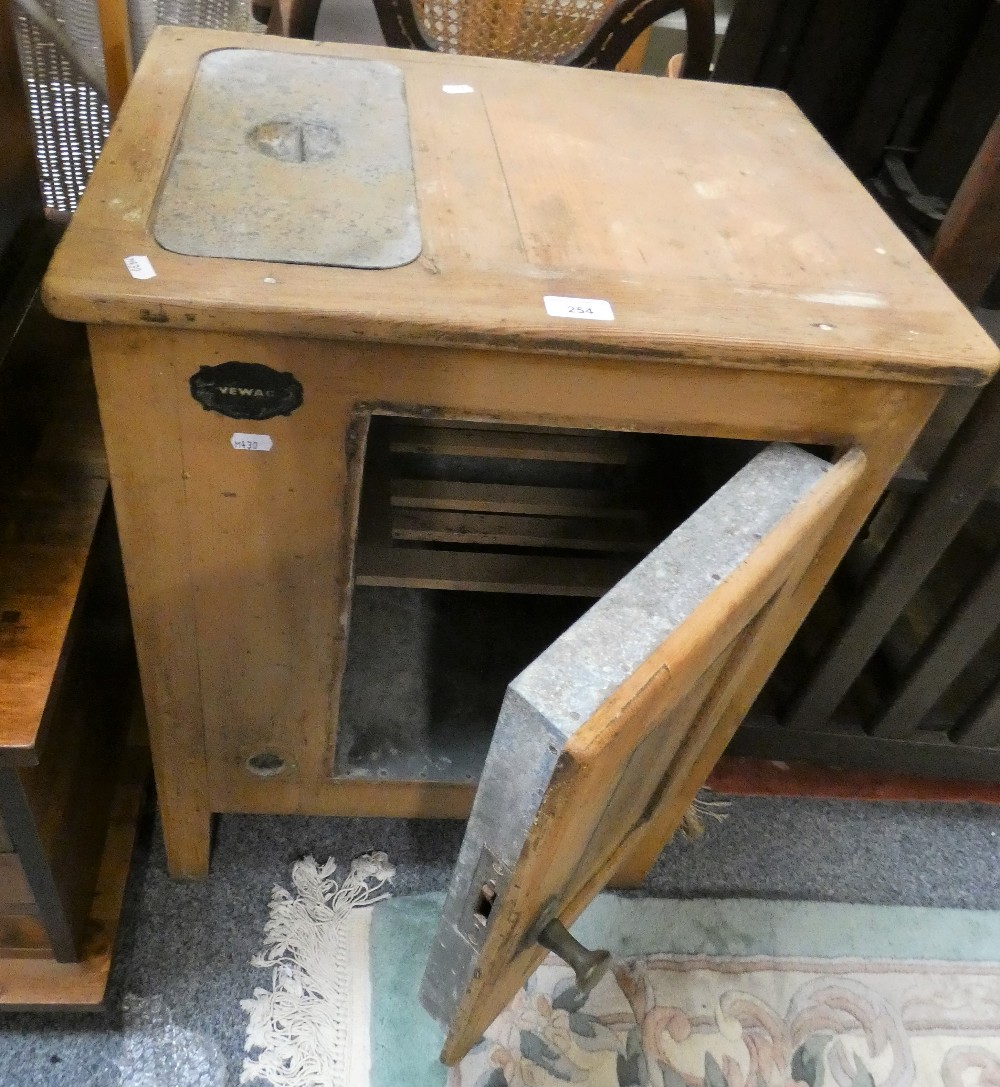 A vintage Vewag pine and galvanised tin fridge, with lift off cover for ice to the left, cupboard