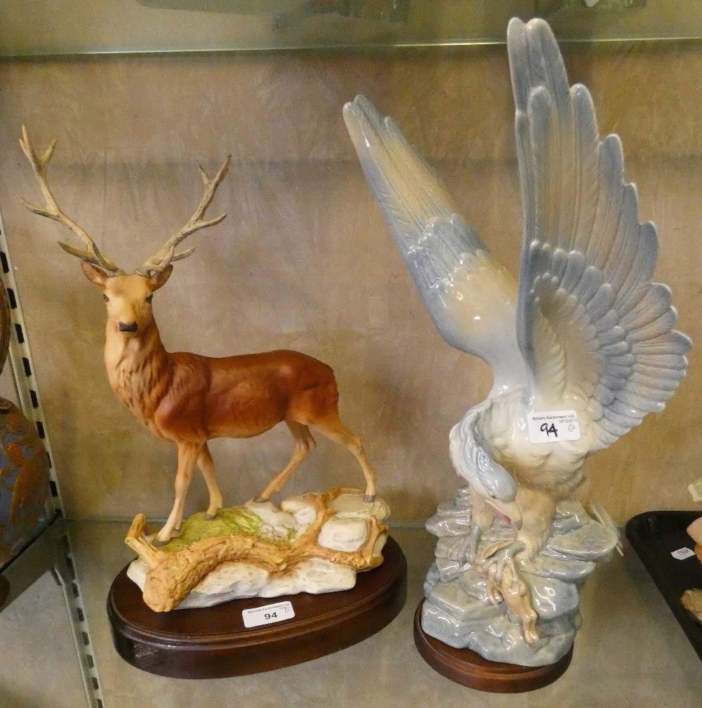 A Spanish model of a mythical bird on plinth together with a Royal Doulton model of a stag on wooden