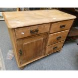 A Victorian pine chest of drawers the right side with three drawers, the left with a drawer over a
