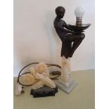 An Art Deco style resin figurine signed R J Pearce of an Arabian dancer 20 cm together with an Art