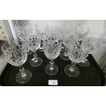A set of four Thomas Webb oxford pattern wine glasses together with seven Normandy pattern wine