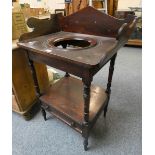 A Victorian stained pine washstand with shaped gallery and hole for a bowl, stretcher drawer, 70 x