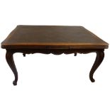 An early 20th century French parquetry-topped oak draw leaf dining table, of serpentine form