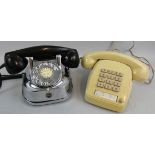 A vintage RTT chrome telephone with bakelite receiver and cradle, c. 1940's, the base reads "RTT