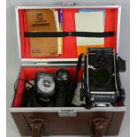 An early 1970's Mamiya C330 'Professional' twin lens reflex camera, together with a cased '