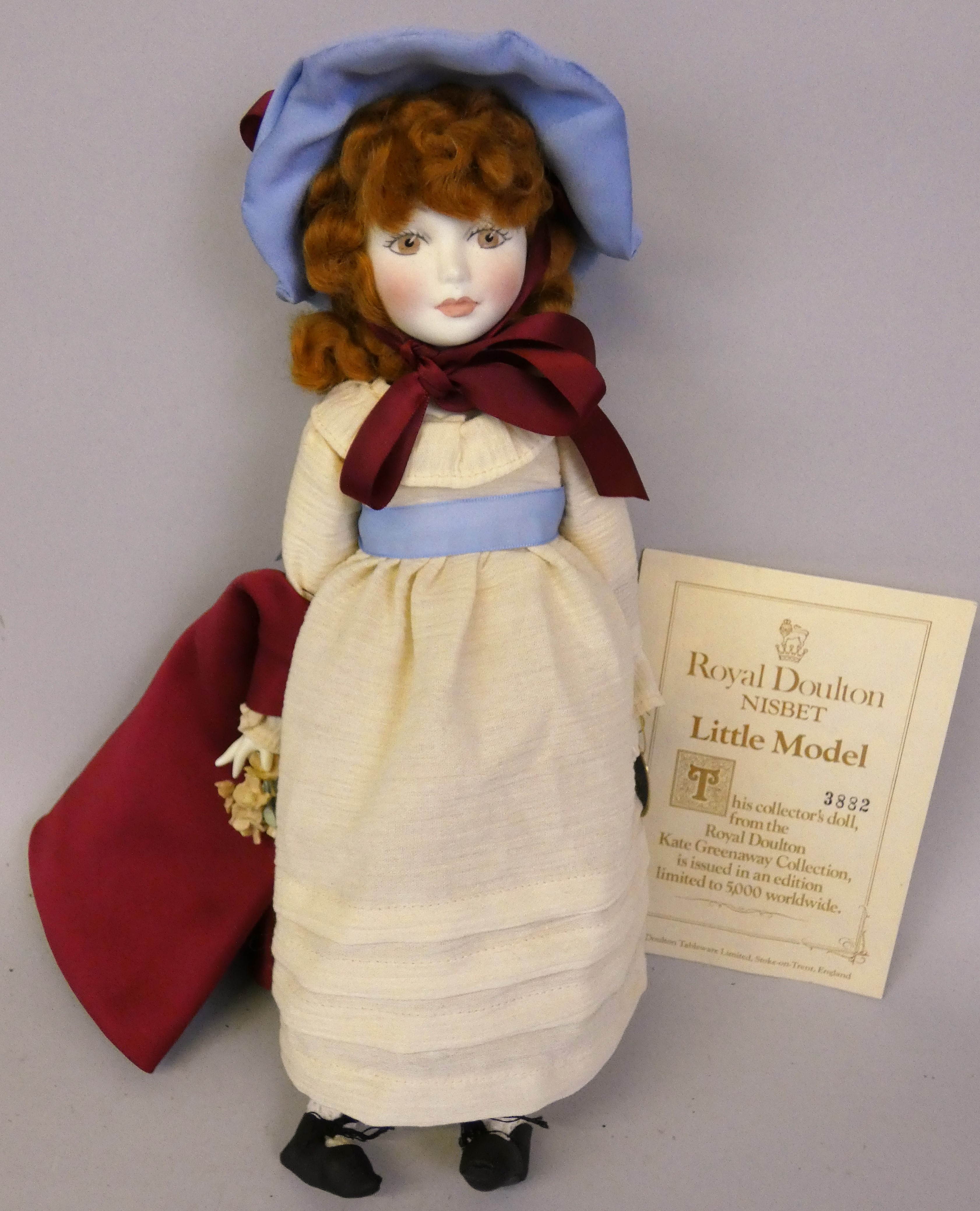 A Royal Doulton Nisbet porcelain limited edition doll "Little Model", No. 3882/5000, together with a - Image 2 of 2