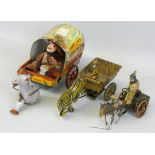 Three early tinplate toys including a 1950's lithographed Mattel Cowboy Joe's Musical Chuck Wagon, a