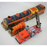 Three early tinplate toys including a Marx Toys locomotive and tender 'The Chief', with friction