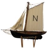 A scratch built model of a late 19th century Brixham style gaff cutter, height 140 cm, overall