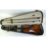 A cased violin with two-piece back and ebony fingerboard, bears label "The