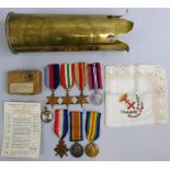 A WWI trio to F. J. Hawkes RFA, a souvenir of Ypres, a locket with a photograph of a soldier and his