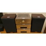 A Denon stacking Hi-Fi system incorporating stereo amplifier, an UPA-FO7 compact disk player, a