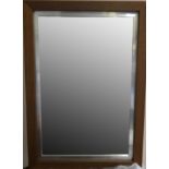 A modern framed wall mirror, 102 cm x 71 cm