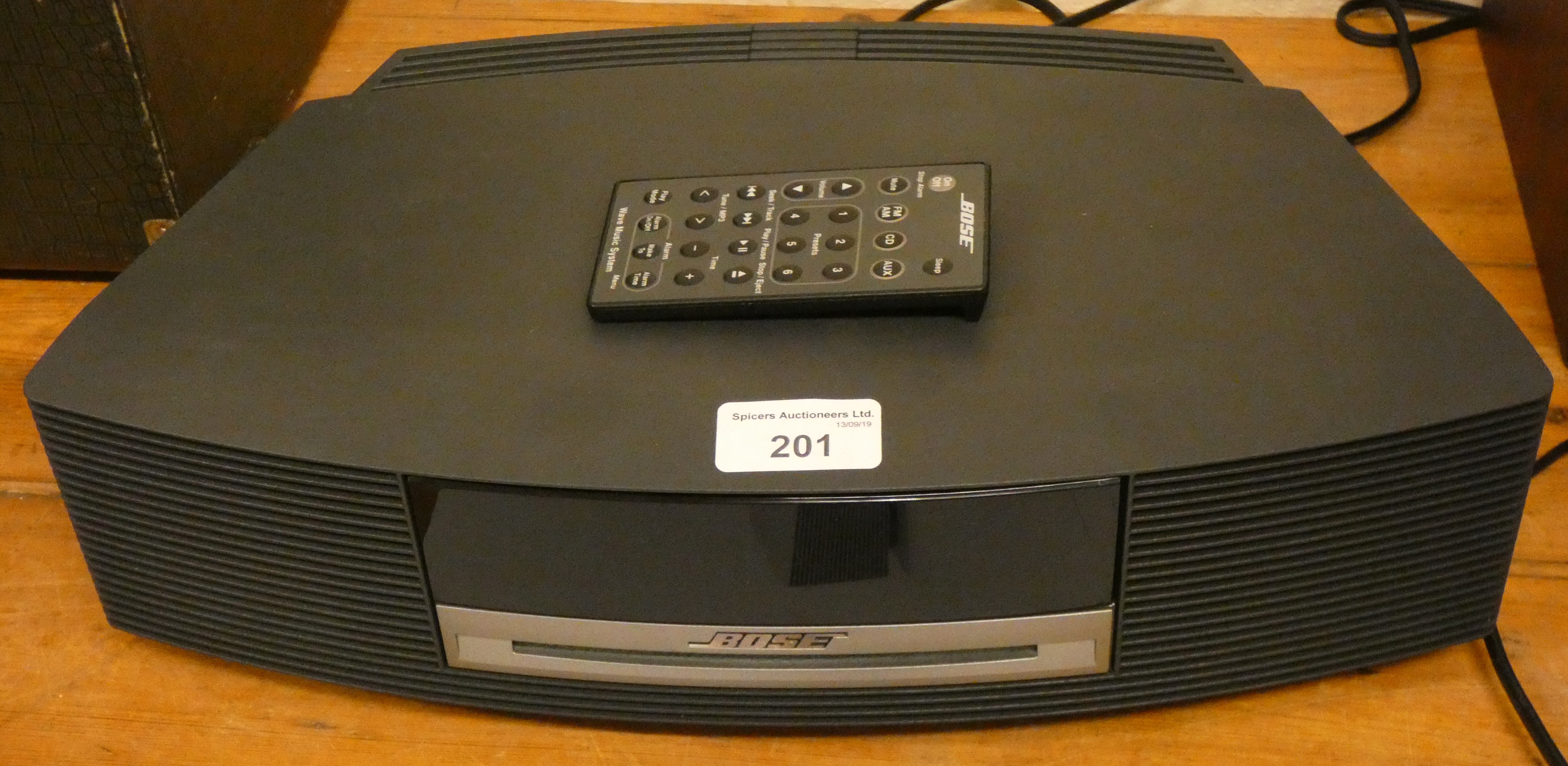 A Bose wave music system 2009, with power lead, remote and instruction manual