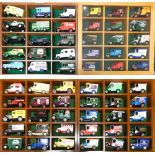 Sixty diecast models including Lledo, Days Gone, Corgi together with display cabinets (4)