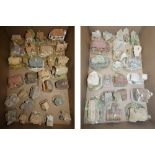 Approximately fifty unboxed Lilliput Lane models