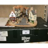 A boxed Lilliput Lane model 'Shopping in the Shambles' L3113 limited edition number 0270