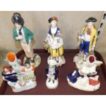 Two Staffordshire spill vases, together with four other Staffordshire figures (6)