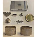 A pair of silver engine turned napkin rings Birmingham 1943, a silver photograph frame Birmingham