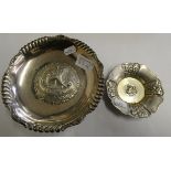 A 925 silver dish embossed with a Viking long ship, together with another smaller example (2)