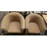 A pair of tub chairs