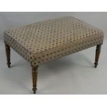 A large mahogany framed rectangular stool, with upholstered seat, raised on tapering turned legs, 94