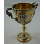 A Victorian silver gilt and silver two handled goblet, by Lias & Lias, London 1866 with applied