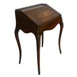 A rosewood with boxwood inlaid ladies writing desk, the fall front with floral motif opening to