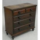 An Edwardian miniature mahogany chest of four graduated long drawers, brass handles, 36 x 28 x 41