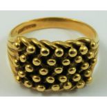 An 18ct gold entwined knot dress ring, Sheffield 1999, weight 12.5 gm, size Y 1/2.