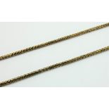 A Victorian 10ct gold long chain, composed of fancy pierced links, 10 c tab and 10 c clip, length