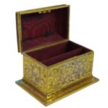 A 19th century French gilt metal letter casket, the lockable hinged cover opening to reveal a fitted